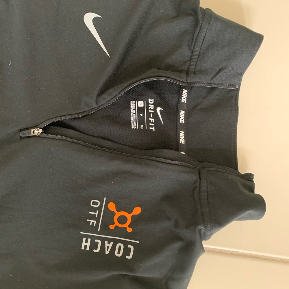 Orange theory fitness long sleeve coaches shirt.